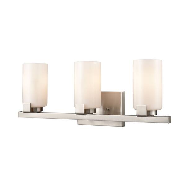 22" Brushed Nickel Vanity 3Light Fixture with Cylinders Mounted Bed